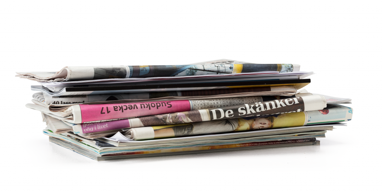 BIld på en hög av tidningar